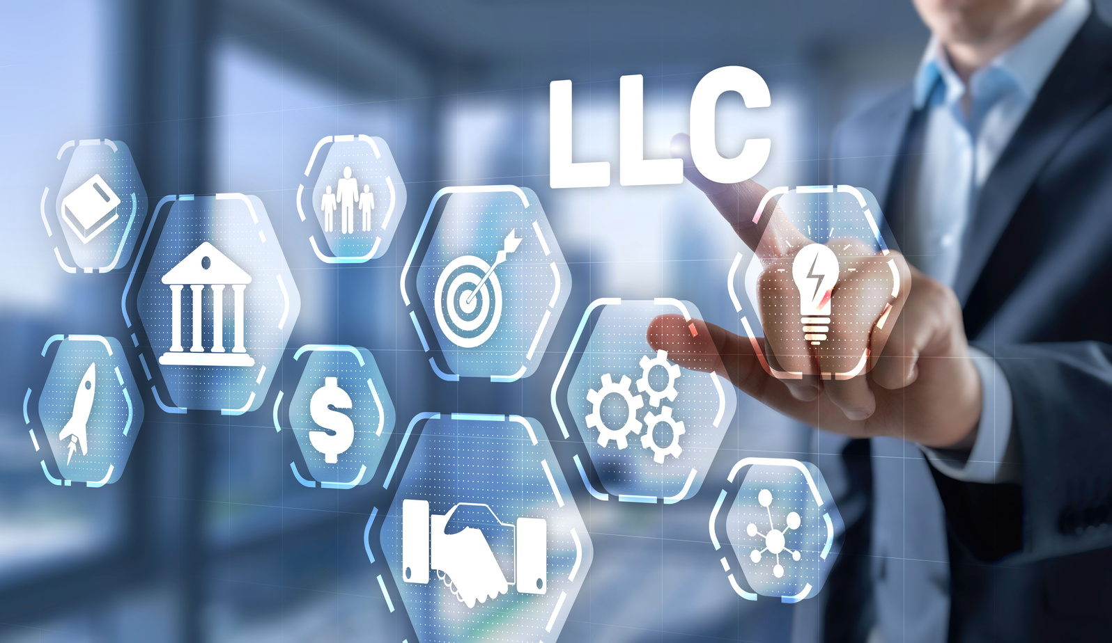 Limited Liability Company concept. Businessman touched LLC on virtual screen.